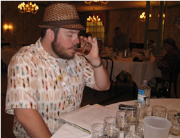 The Rum Dood tastes a sample.